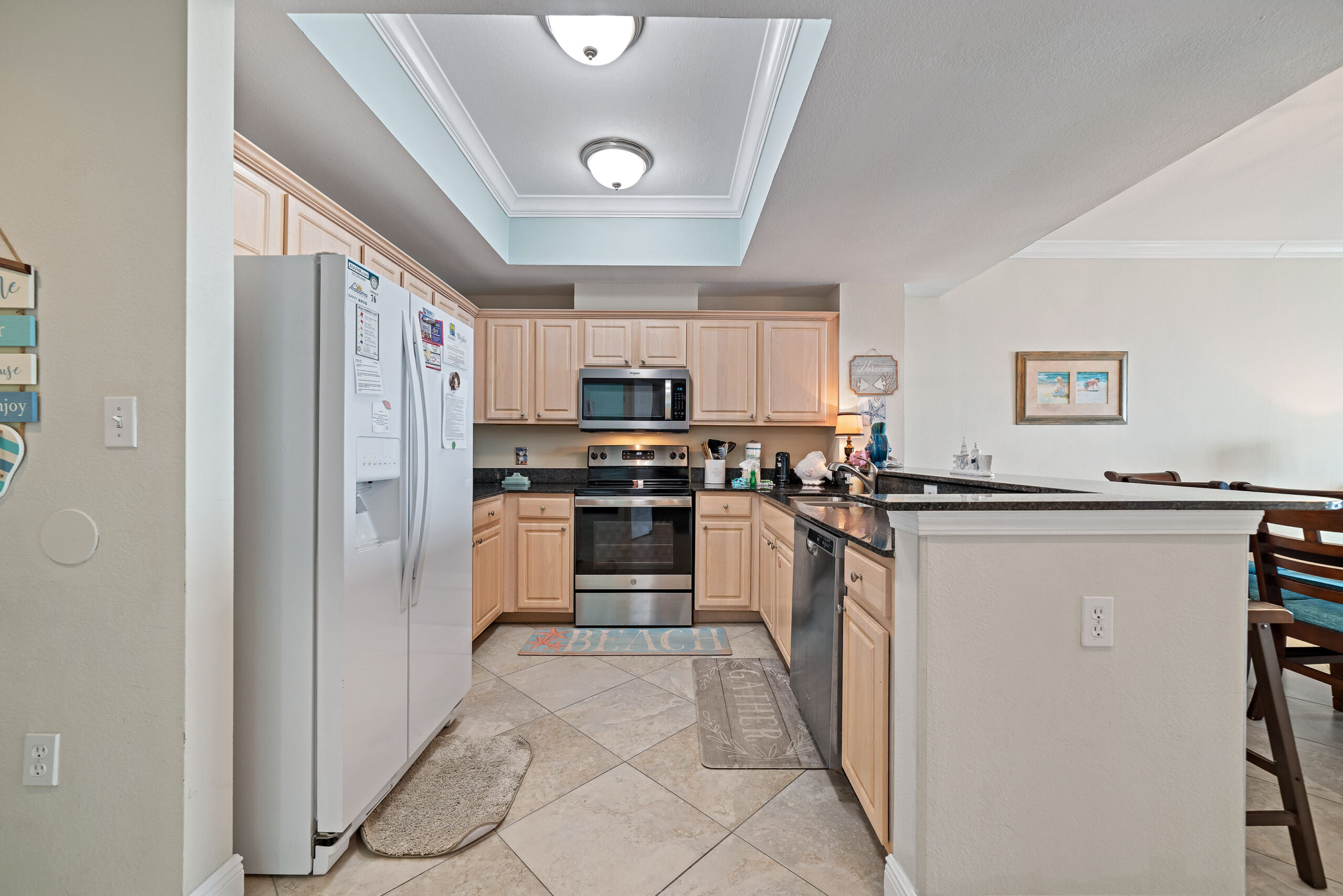 Fully equipped kitchen with coffee bar at Salty Air Retreat