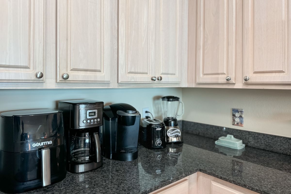 Fully equipped kitchen at Salty Air Retreat Gulf Shores condo
