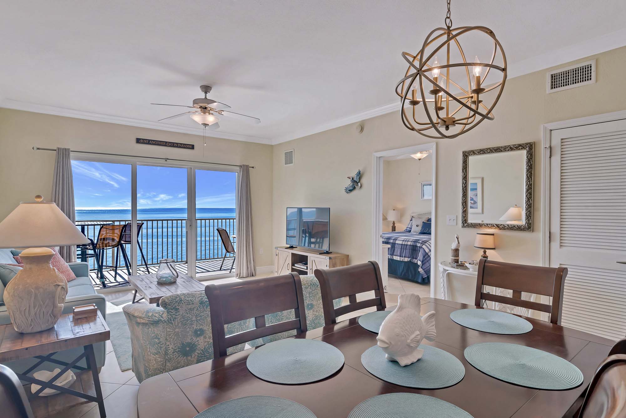 Family enjoying the open living and dining area at Salty Air Retreat